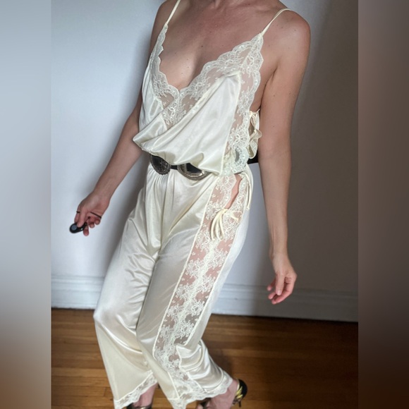 Lingerie jumpsuit made of nylon and lace with cute ties on the side. Open size. - Picture 1 of 14
